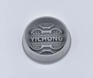 Detailed view of a grey silicone slow feeder bowl with maze patterns for pet health.