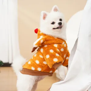 Detail of orange polka dot fleece pet hoodie with cute reindeer antlers for Christmas