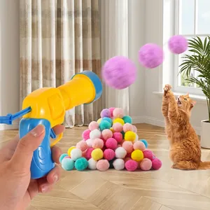 Pistola giocattolo interattiva per gatti con pompon colorati in poliestere per il gioco