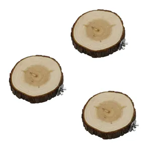 Close-up of three natural wood round bird perches with metal wing nut fixings