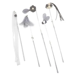 Detailed collection of five stylish cat teaser wands featuring feathers and pom-poms