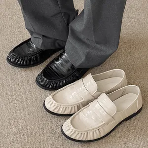 Designer crocodile textured slip-on loafers for men in black and beige 2025 style