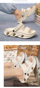 Nahaufnahme von beigefarbenen Herren-Plateausandalen mit Doppelriemen und Fußbett