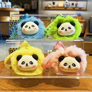 Juego de cuatro coloridos llaveros de panda de peluche con dijes faciales suaves y correas