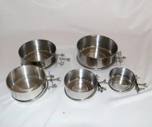 Detail view of five stainless steel bird cage feeders with wing nut mounting brackets