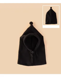 Detailed view of black fleece pet balaclava with pom-pom and adjustable drawstring
