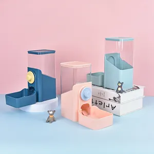Detailed view of automatic pet feeders for cats and dogs in pink and blue pastel colors.
