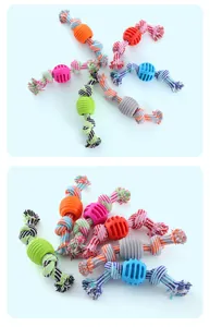 Detailed view showing multiple colorful cotton rope dog chew toys with TPR balls for dental care
