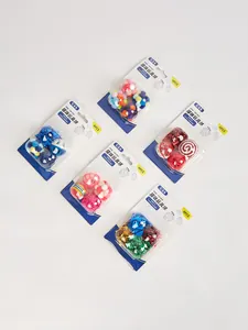 Detailed showcase of five multi-colored 4-pack cat toy sets featuring bells and balls