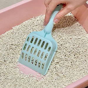 Light blue plastic cat litter scoop with hollow grid design for easy cleaning.