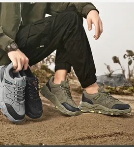 Detailed shot of men's outdoor casual hiking shoes in three colors on a sandy terrain.