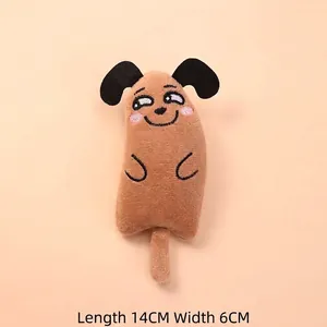 Detailed view of funny embroidered facial expression on brown plush catnip cat toy