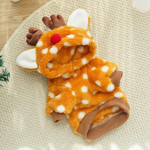 Detailed flat lay of a plush orange reindeer pet costume with soft white polka dots