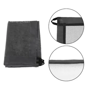 Close-up detail of foldable pet safety mesh gate showing fabric edge and reinforced loops