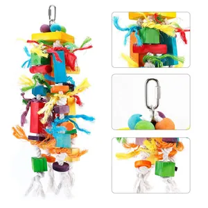 Close-up detail of colorful wooden blocks and vibrant cotton ropes on parrot chewing toy.