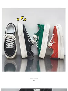 Vertical display of thick-soled canvas sneakers in black, green, and red colors.