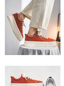 Detailed view of burnt sienna thick-sole canvas sneakers with contrasting white stitching.