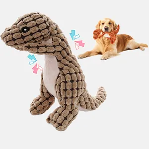 Durable plush dinosaur squeaky dog toy with pineapple fleece texture for heavy chewers