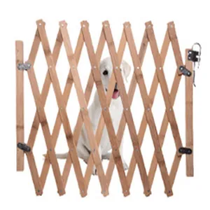 Detailed view of the expandable wooden pet safety gate with folding accordion design.