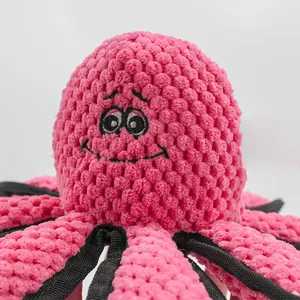 Juguete de peluche de pulpo rosa para perros con sonido y textura de pana de maíz resistente