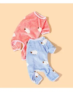 Detail view of soft coral fleece sheep print dog pajamas in pink and blue color options.