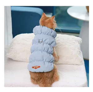 Back view of light blue quilted pet puffer vest with dual metal D-rings for cats and dogs