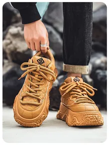 Close-up of camel leather bread shoes with thick soles and textured finish
