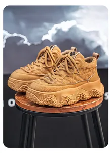 Tan high-top quilted leather boots with chunky wavy soles for winter outdoor wear