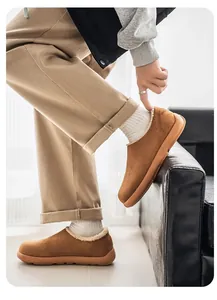 Detail view of premium men's warm fur-lined brown suede clogs for autumn and winter