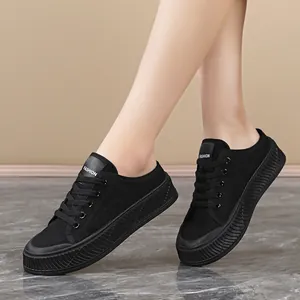 Elegant black canvas platform sneakers for women featuring FASHION print on tongue