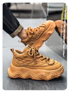 Brown high-top leather platform sneakers with diamond quilting and chunky textured soles