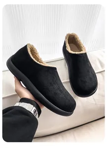 Close-up of high-quality black suede-like men's loafers with warm fleece lining