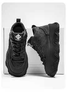 Close-up detail of black leather high-top sneakers featuring a chunky wavy platform sole.