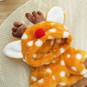 Detailed view of plush reindeer pet hoodie with antlers and soft fleece texture.
