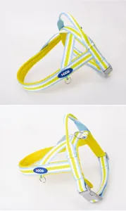 Detailed view of a breathable mesh dog harness with blue and yellow stripes pattern.