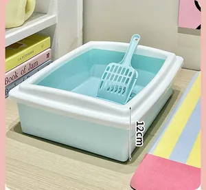 Macro view of semi-enclosed blue cat litter box showing 12cm side height and matching scoop