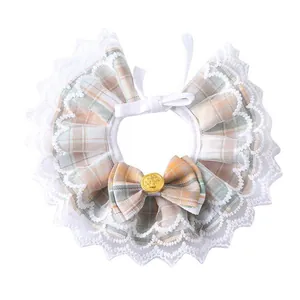 Cute plaid pet collar bib with white lace trim and bow accessory for cats and small dogs