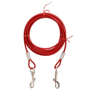Detailed close-up view of a red coiled steel wire pet leash with durable silver snap hooks.