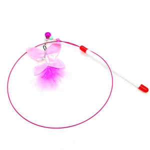 Detailed view of the pink butterfly and feather attachment on a steel wire cat teaser wand