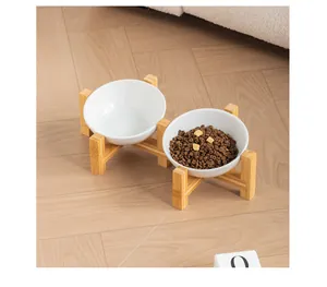 Detailed view of premium elevated double ceramic pet bowls with solid bamboo stand