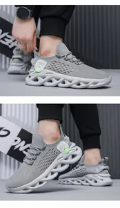 Detailed view of lightweight grey breathable mesh sneakers with unique wavy sole