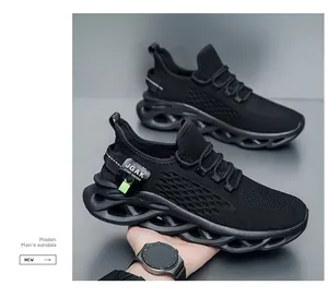 Breathable men's black fly-knit athletic sneakers with unique hollowed-out sole details