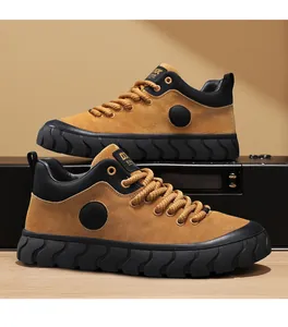 Side view of retro mustard yellow suede sneakers with thick black lug soles