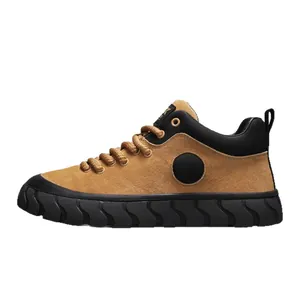 Retro suede low-top sneakers with thick textured sole for men in brown and black finish.