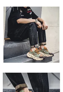 Close-up of men's chunky sneakers with thick wave soles and breathable mesh
