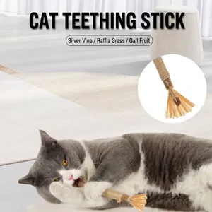 Detailed view of natural cat silvervine molar stick toy with raffia and gall fruit