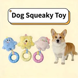 Detailed view of plush monster dog squeaky toys with rubber donut teething rings.
