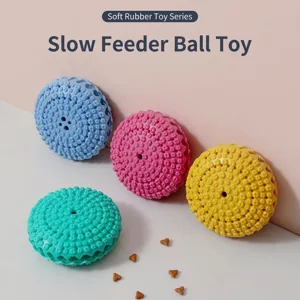 Four colorful silicone puzzle food dispenser balls for pets playing and training