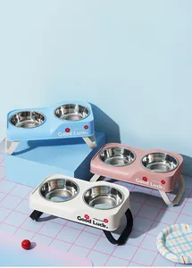 Elevated foldable double pet bowls with stainless steel inserts in three pastel colors