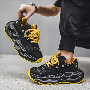 Stylish men's breathable mesh chunky sneakers in black and yellow fashion.